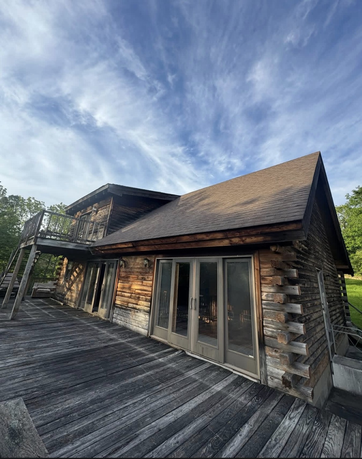 The log cabin and its deck