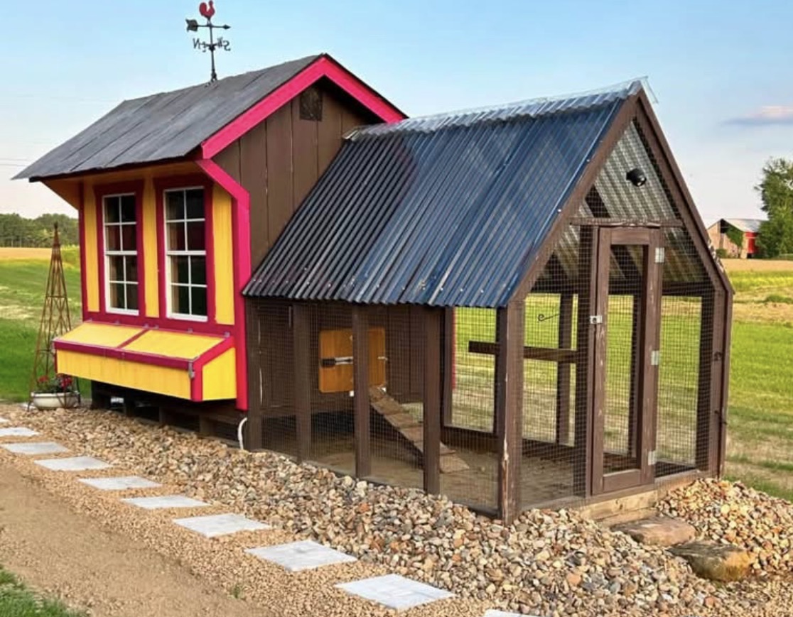 Side view. Note the covered run, the weathervane, and the property value.